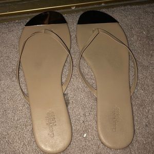 Gold tip flip flops